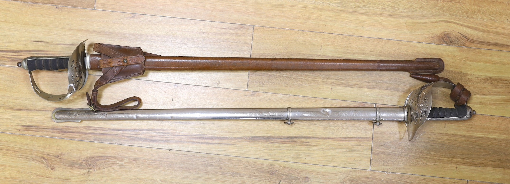 Two George V infantry officer's swords, 100cms long.